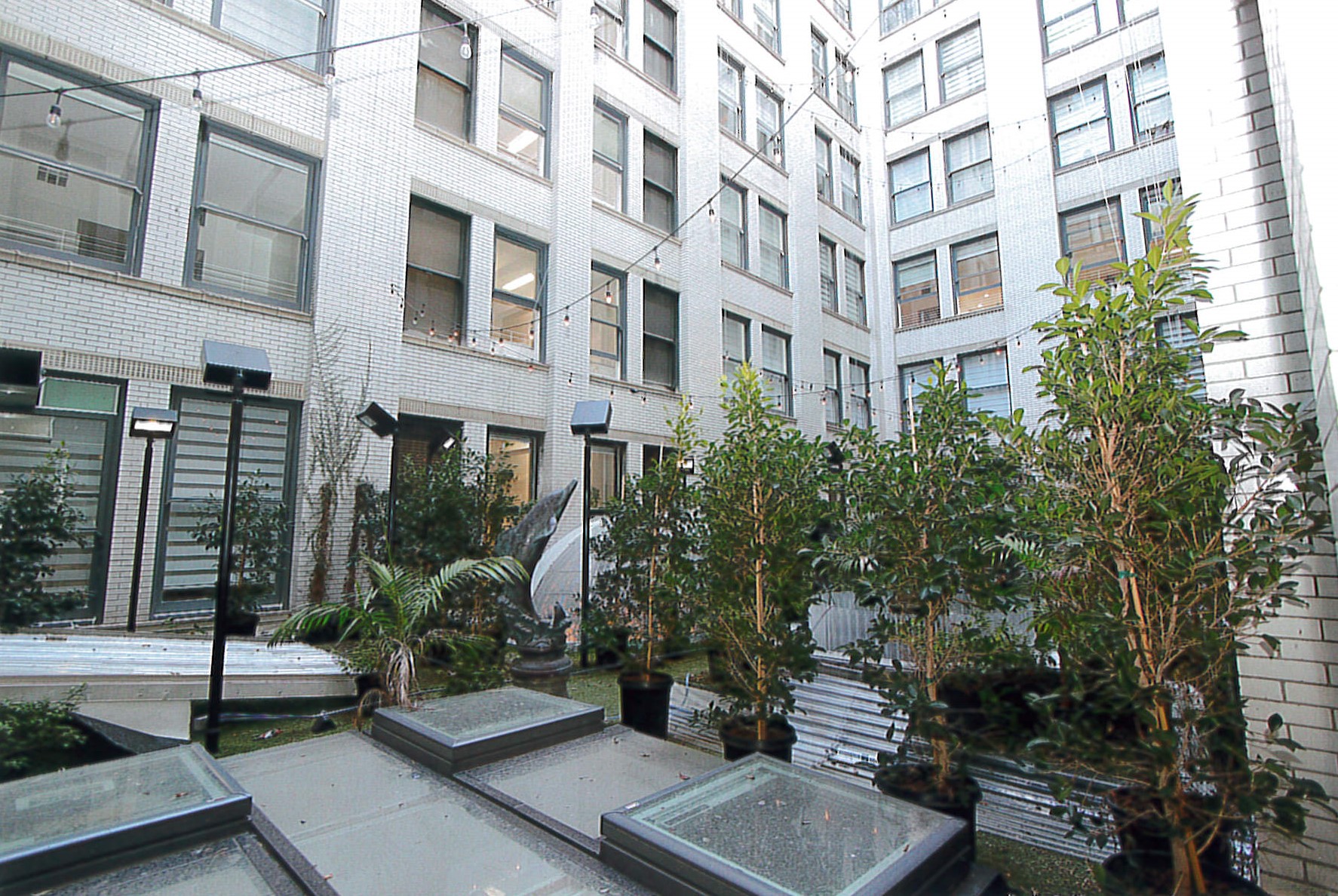 Second floor light court, added green scaping, rehabilitated skylights